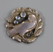A Georg Jensen sterling silver and cabochon moonstone set "dove" brooch, no. 123, import marks for
