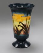 A William Moorcroft 'Reeds at Sunset' pattern vase designed by Philip Richardson, of tapered