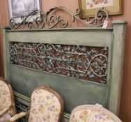 A light green carved wood head and foot double bedstead W.165cm