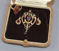 A pair of garnet and diamond earrings, a 9ct gold and garnet navette-shaped dress ring and an