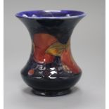 A Moorcroft pomegranate vase height 11cm