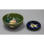 A Moorcroft leaf and berry bowl and a similar dish diameter largest 16.5cm