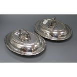 A pair of Victorian plated oval lidded entree dishes length 29cm