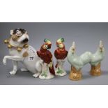 A Meissen style model of a pug and a pair of Chinese porcelain cockerels and a pair of porcelain