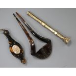 An early 20th century yellow metal overlaid propelling pen and two tortoiseshell items including a