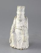 A Chinese ivory figure of an immortal, possibly Guandi, early 20th century, in Ming style, height