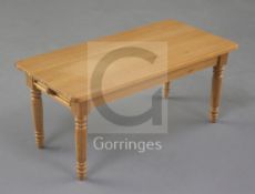 Denis Hillman. A Victorian style miniature kitchen dining table, fitted one drawer, raised on turned