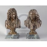 A pair of French bronze busts of Voltaire and Moliere, each on a shaped faux green marble base,