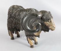 An 18th / 19th century naturalistically carved figure of a ram, L.35.5in.