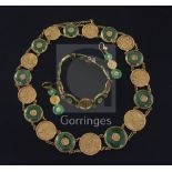 A Chinese high carat gold and jadeite suite of jewellery, comprising a necklace, bracelet and pair