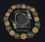 A Chinese high carat gold and jadeite suite of jewellery, comprising a necklace, bracelet and pair