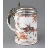 A Chinese export Rouge de fer and gilt porcelain mug, c.1730, with 18th/19th century German silver