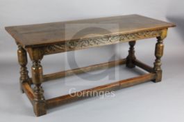 A 19th century James I style oak refectory table, with baluster legs and all round stretchers, W.6ft