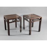 A pair of Chinese hongmu square tables, 19th century, with moulded edges and legs with scrolled