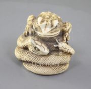 A Japanese ivory netsuke of the 'sansukumi' (snake, frog and snail), 19th century, signed,