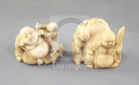 Two Japanese ivory netsuke of Hotei and a boy, Meiji period, one in walrus ivory, unsigned, width