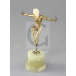 R. Loz. An Art Deco ivory and bronze figure of a dancer, raised on a green onyx pedestal base,