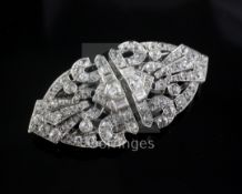 A 20th century Art Deco style white gold? and diamond double clip brooch, of ovoid shape and set