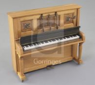 Denis Hillman. A Victorian style walnut miniature upright piano, with detachable candle sconces