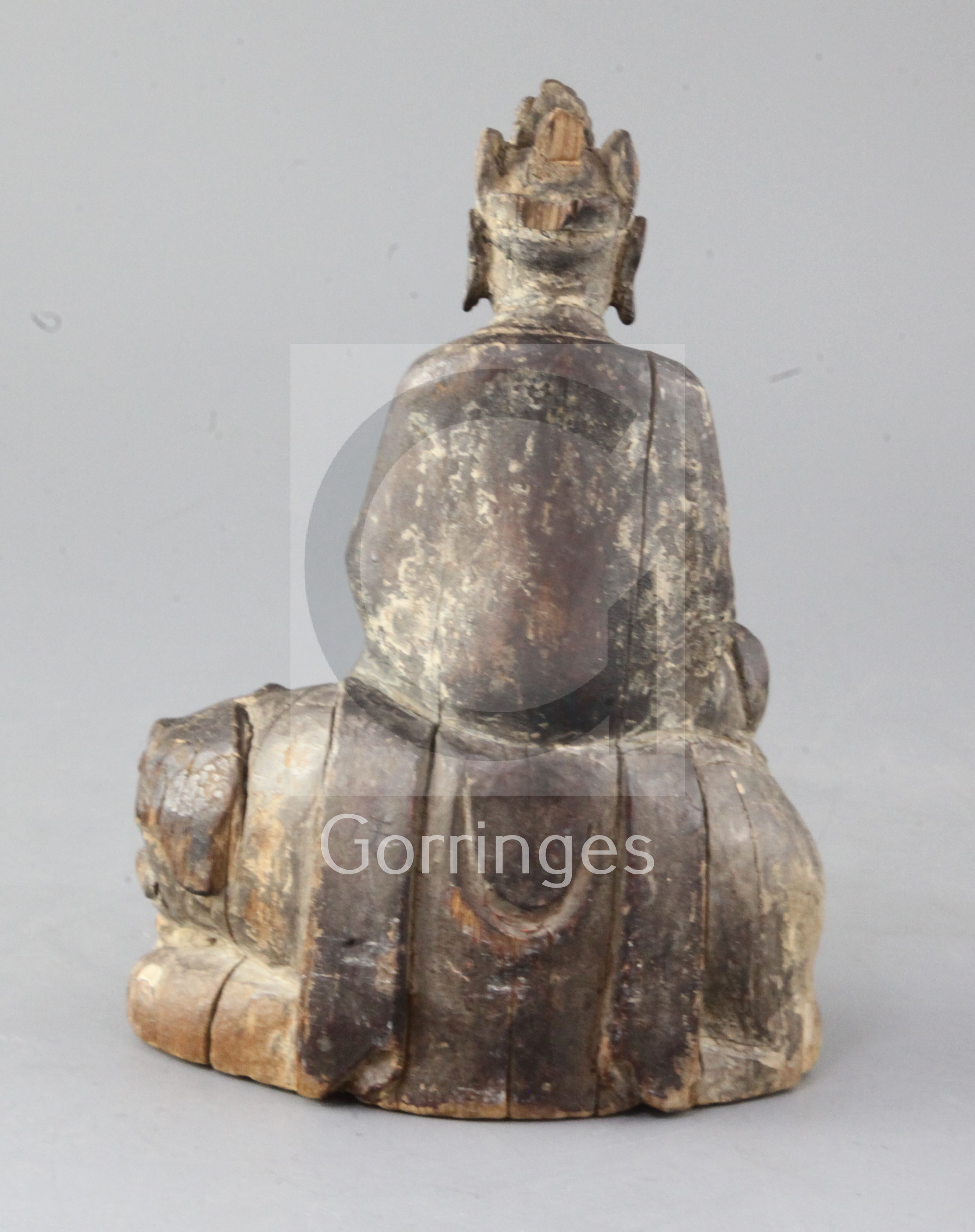 An early Chinese wood group of Wenshu or Manjushri, Song/Yuan dynasty, seated in Royal ease upon a - Bild 2 aus 3