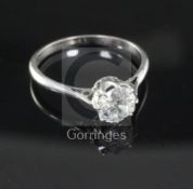 An 18ct white gold and solitaire diamond ring, the old cut stone weighing approximately in excess of
