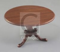 Denis Hillman. A Regency style mahogany miniature circular tilt top breakfast table, raised on a