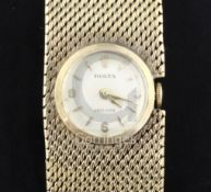 A lady's 9ct gold Rolex precision manual wind bracelet wrist watch, with baton numerals, overall