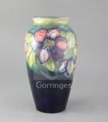 A Moorcroft clematis pattern baluster vase, c.1940s impressed mark W.Moorcroft potter to HM the