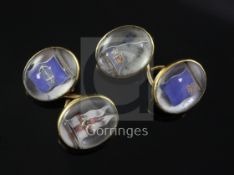 A pair of 18ct gold Essex crystal cufflinks depicting naval flags, gross weight 13.7 grams.