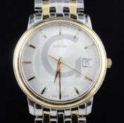 A gentlemen's stainless steel and yellow metal Omega quartz wrist watch, with silvered dial and
