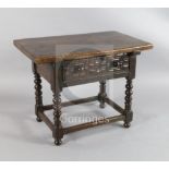 A 17th century Spanish walnut table the rectangular top raised on bobbin turned legs joined by