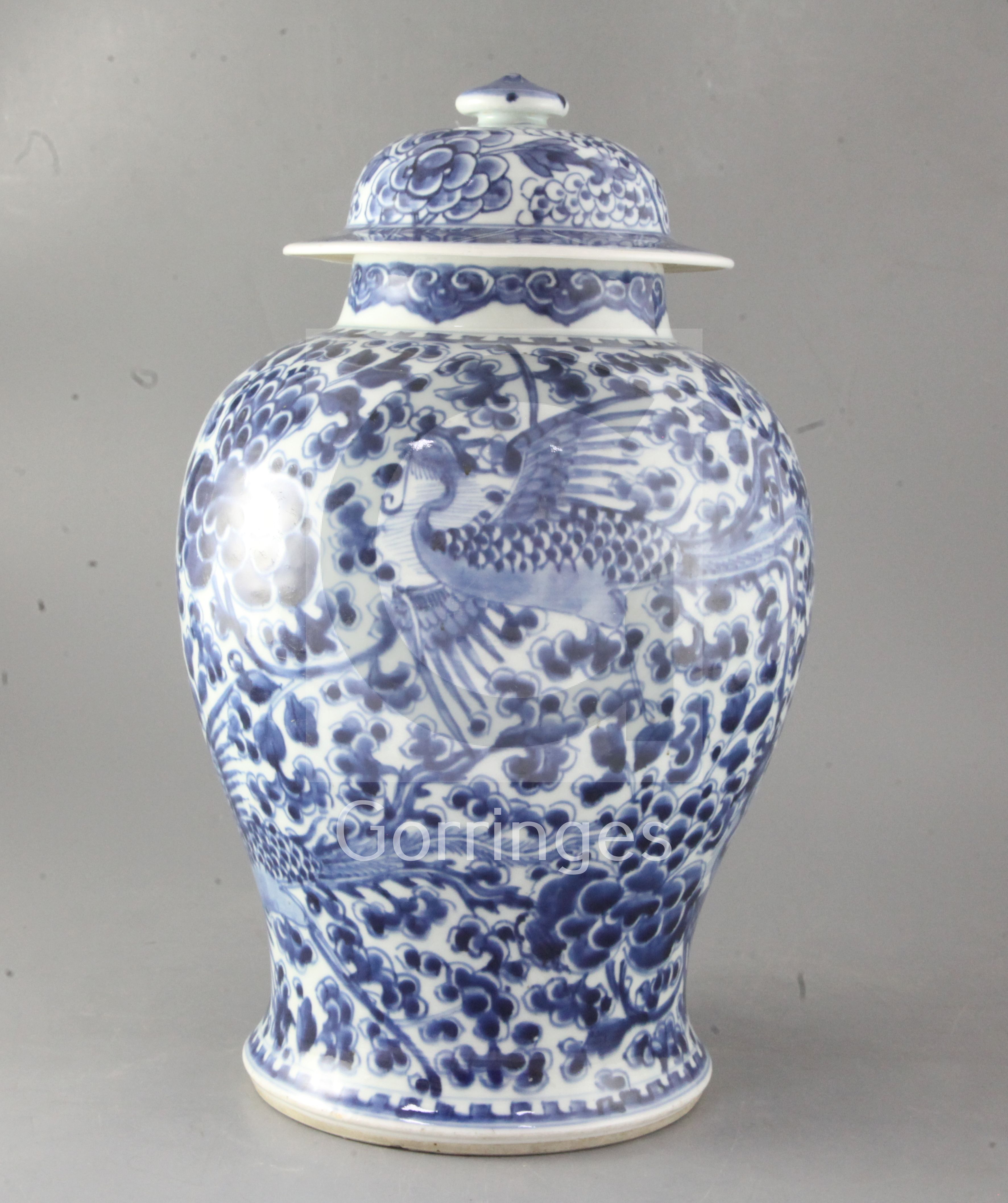 A Chinese blue and white baluster vase, Kangxi period, painted with phoenixes amid peonies and - Bild 2 aus 3