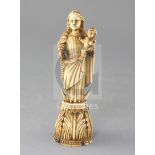 An Indo-Portuguese ivory group of the Virgin and Child, height 7.5in.