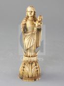 An Indo-Portuguese ivory group of the Virgin and Child, height 7.5in.