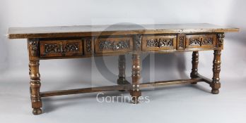 A mid 17th century Italian walnut table, the rectangular single plank top with frieze carving and