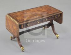 Denis Hillman. A Regency style banded burr walnut and rosewood banded miniature sofa table, fitted