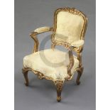 Denis Hillman. A Louis XV style gilt carved wood miniature fauteuil, with cream silk brocade