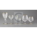 A Stuart thirty four piece part suite of cut glassware, with gilded rims and feet