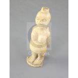 A 19th century African ivory group of a mother and child, height 3.25in.