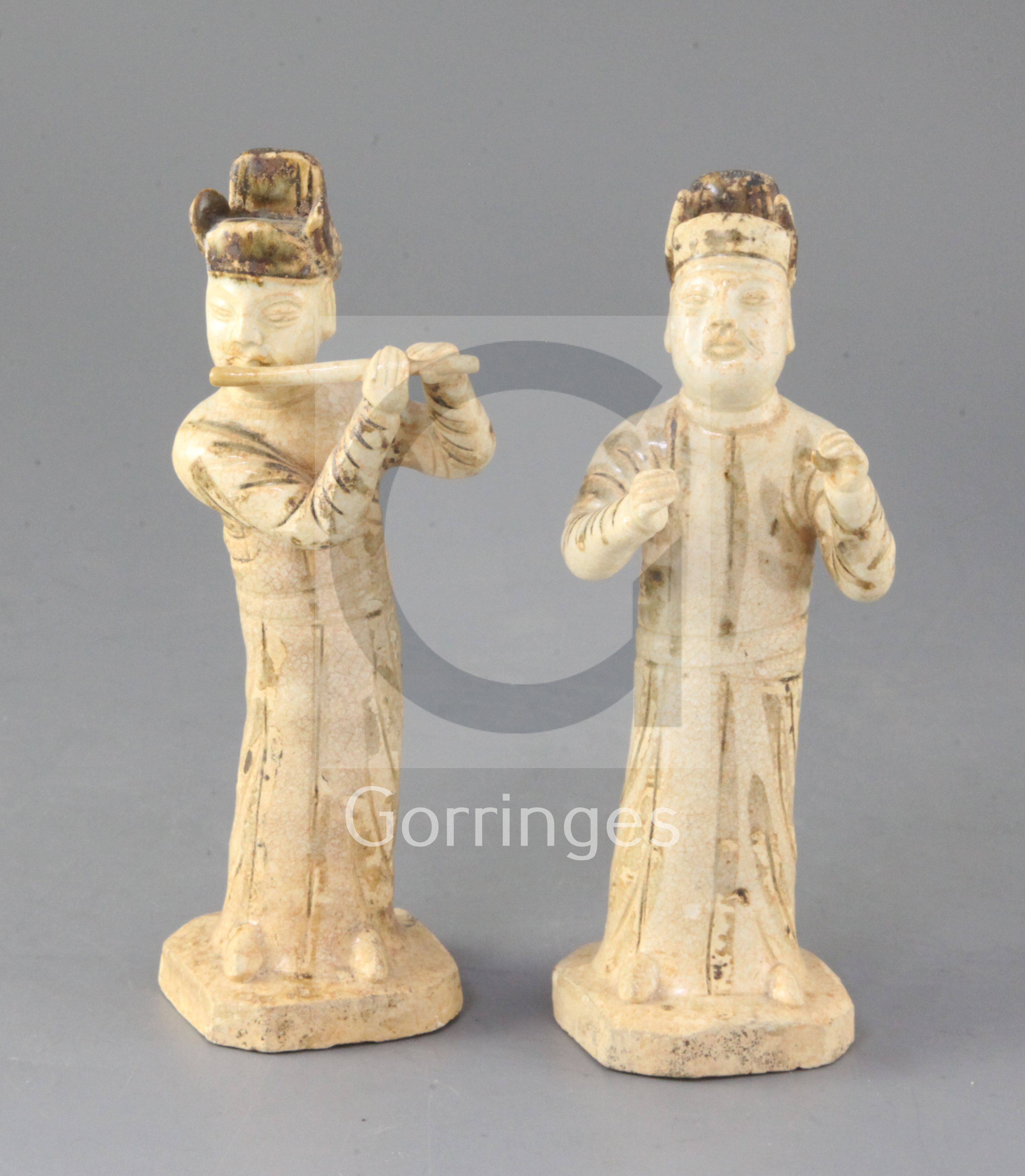 Two rare Chinese Qingbai standing figures of musicians, Song dynasty (11th/12th century), the