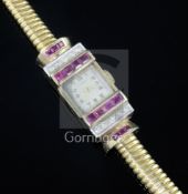 A lady's 1950's? high carat gold, synthetic? ruby and diamond set cocktail watch, with rectangular