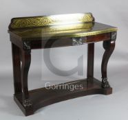 A Regency brass inset rosewood bowfront console table, attributed to George Oakley, with raised