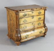 A mid 18th century Dutch pinewood ogee shaped chest, with four long drawers, on bowed base, W.3ft