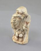 A Japanese porcelain netsuke a Sennin, 19th century, unsigned, 5.3cmProvenance: purchased from