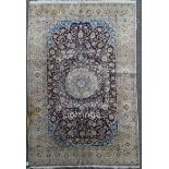 An Isfahan carpet, with field of scrolling foliage, on an ivory ground, 8ft 4in by 4ft 8in.