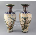 A pair of Royal Doulton stoneware baluster vases, decorated by Eliza Simmance, with stylised foliate