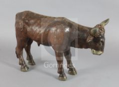 An 18th / 19th century carved and painted figure of a bullock, possibly from a Créche group, L.14.