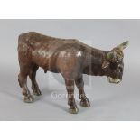 An 18th / 19th century carved and painted figure of a bullock, possibly from a Créche group, L.14.