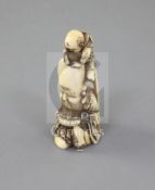 A Japanese ivory netsuke of Fukurokuju and a boy, 19th century, signed Minkoku, the boy at the top