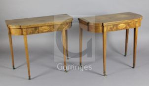 A pair of George III style mahogany 'D' shaped tea tables, with boxwood strung rosewood banding